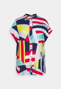 Camicia a maniche corte, con bottoni, in un tessuto leggero caratterizzata da un motivo astratto vibrante di rosso, blu, giallo e bianco.