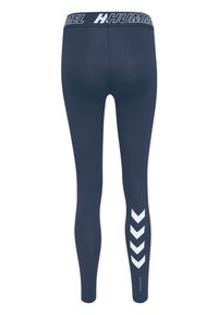 Leggings blu navy realizzati in materiale elasticizzato con un cinturino con logo bianco e un motivo a zig zag lungo i lati. Texture liscia e design aderente.