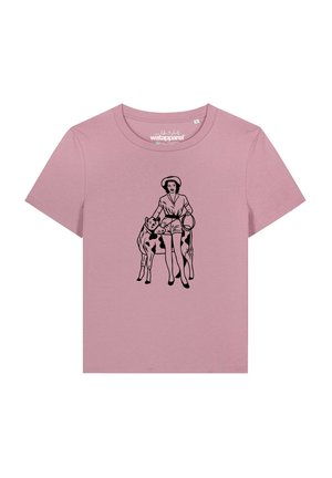 Light purple short-sleeve t-shirt with a black illustration of a person wearing a hat standing next to a calf.