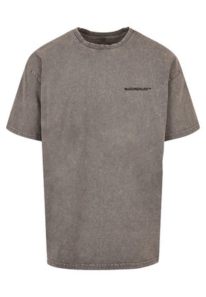 Kortærmet grå t-shirt med falmet tekstur og lille sort "MJGONZALES" tekst på venstre bryst.