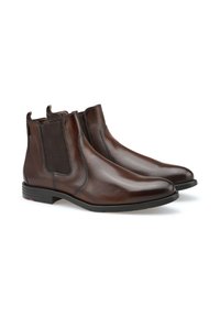 Braune Leder Chelsea-Stiefel mit elastischen Seitenpanelen, runder Zehenpartie, subtilen Steppdetails und einem niedrigen schwarzen Gummiabsatz.