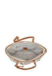 Sac fourre-tout à motif floral sur fond crème, avec des poignées en cuir marron et un intérieur spacieux gris comprenant une poche zippée.