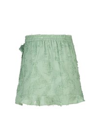 Lichtgroene rok van textuurstof met een ruffle onderrand en elastische tailleband, met een franjesontwerp door de hele rok.