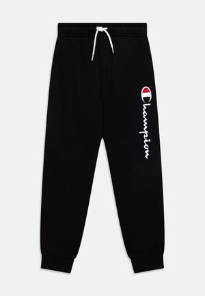 Sorte joggingbukser med hvid snor, ribbet manchet og lodret hvid Champion-logo med rød og hvid emblem på venstre ben.