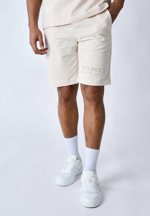 CLASSIQUE BRODE - Pantalones deportivos - ivoire
