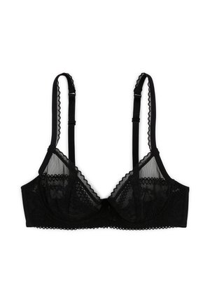 Soutien-gorge en dentelle noire avec des bretelles ajustables, des bords festonnés et un design transparent. Présente des motifs floraux et un nœud au centre.