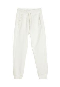 Hvide joggers lavet af blødt stof, med elastisk talje, to sidelommer og tætsiddende manchetter ved anklerne.