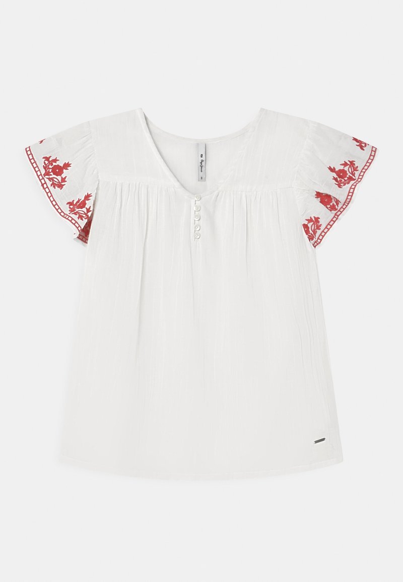 Camicia bianca con maniche corte a volant con ricamo floreale rosso lungo i polsini. Bottoni sul davanti e tessuto dalla trama lavorata.