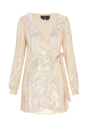 Vestito corto a portafoglio color champagne con maniche lunghe, caratterizzato da paillettes verticali, scollatura a V profonda e dettaglio con fiocco in vita.