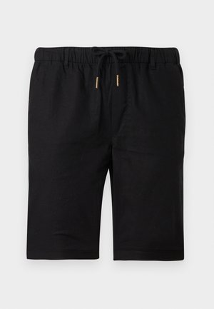Shorts noirs longueur genou avec taille élastique, cordon noir à embouts métalliques dorés, et passants de ceinture sur fond blanc.