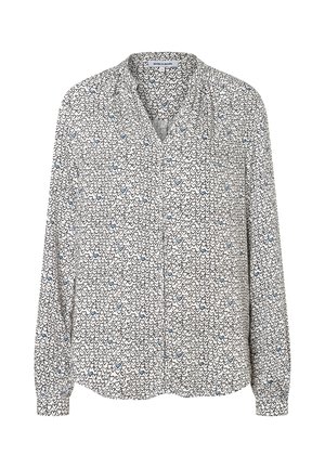 Bluse mit Knopfleiste aus leichtem Stoff mit schwarz-weißem Herzmuster und hellblauen Akzenten, langen Ärmeln und weicher Textur.