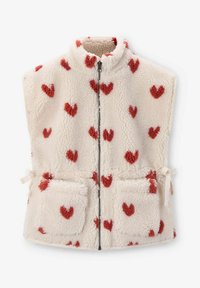 Gilet en crème flou avec motifs de cœurs rouges, col montant, fermeture éclair devant et deux poches plaquées avec cordons sur les côtés.