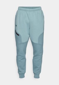 Under Armour UNSTOPPABLE FLEECE - Tracksuit bottoms - jasper blue/serpentine/black