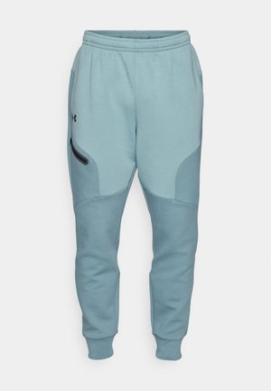 Under Armour UNSTOPPABLE FLEECE - Tracksuit bottoms - jasper blue/serpentine/black