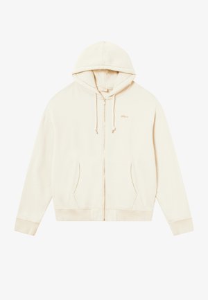 Felpa zip con cappuccio color crema, dotata di un cappuccio con cordino, tasche a marsupio, polsini e orlo a costine. Presenta un piccolo logo ricamato sul petto.
