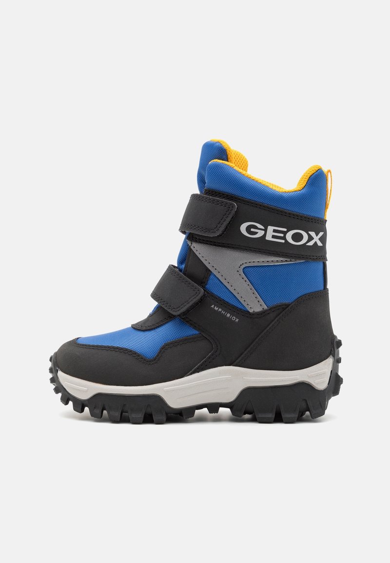 Botte d'hiver pour enfants en bleu et noir avec doublure jaune, deux bandes Velcro et semelle robuste, étiquetée "Geox" et "Amphibiox" sur le côté.