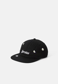 Black cap made of cotton with a curved bill. Features embroidered text "Service" and small egg motifs on the crown.