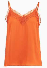 Orange linne med spetsdetaljer längs halslinningen. Har tunna justerbara axelband och en mjuk, slät textur genom hela plagget.