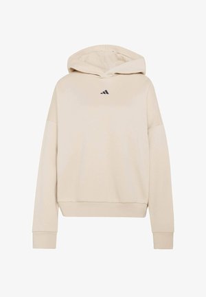Beige hoodie met een capuchon met trekkoord, geribbelde manchetten en zoom. Heeft een klein zwart adidas-logo op de borst. Zachte, gladde stoftextuur.
