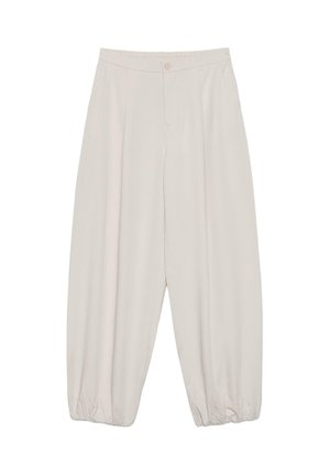 Béžové široké nohavice s vysokým pásom, pružnými manžetami, predným gombíkom a zipsom.