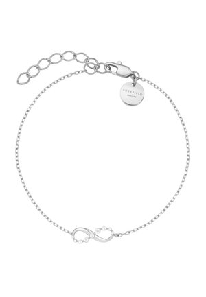 Zarter silberner Kettchenarmband mit einem Unendlichkeitssymbol, verziert mit kleinen klaren Steinen, und einem runden Anhänger mit der Gravur "ROSEFIELD AMSTERDAM."