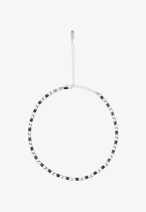 Silberne Kettenarmband mit abwechselnd schwarzen Akzenten, Gliedern in verschiedenen Formen und einem verstellbaren Verschluss mit Kettenverlängerung.