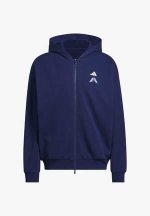 Granatowa bluza z kapturem zapinana na zamek, wykonana z miękkiego materiału, z przednim zamkiem błyskawicznym, bocznymi kieszeniami i białym logo na piersi.