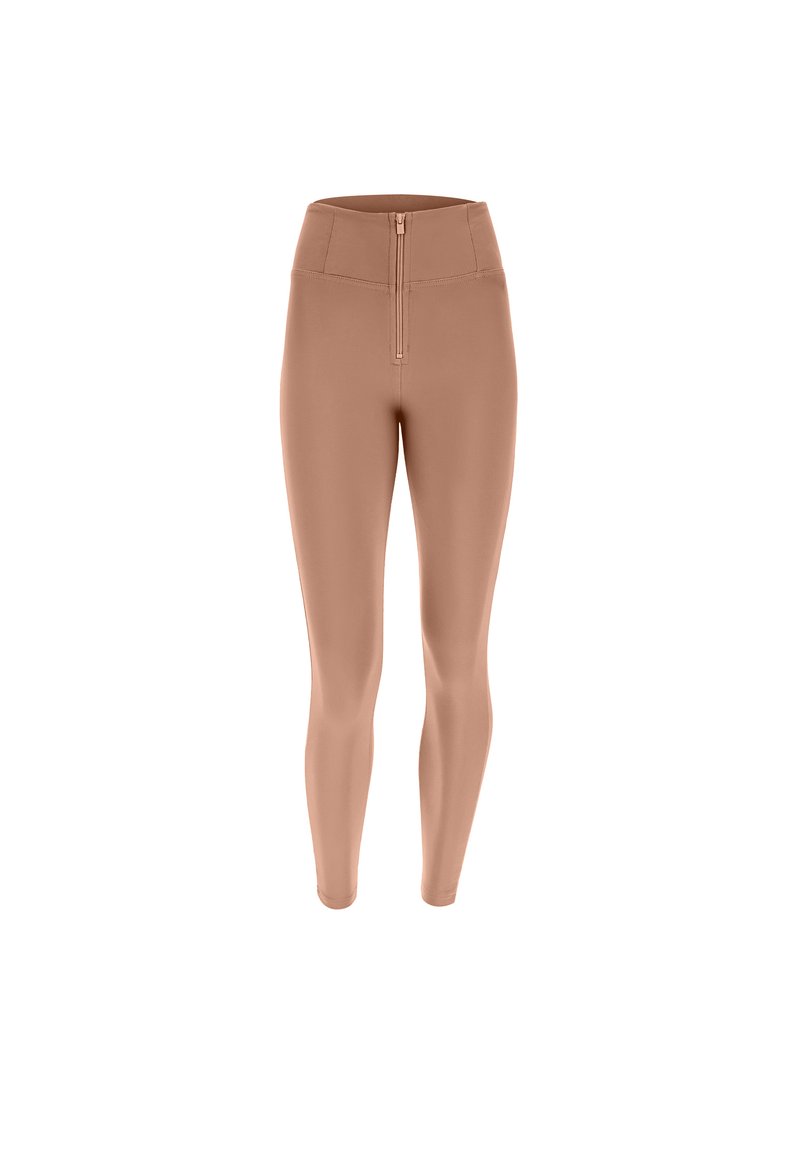 Leggings de talle alto en color nude, confeccionados con una tela suave y elástica, con cierre con cremallera en la parte delantera y un silueta ajustada.