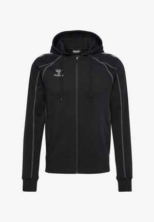 Zwarte hoodie met ritssluiting en capuchon, voorzien van grijze stiknaden en een logo op de borst. Zachte stof met lange mouwen en steekzakken aan de voorkant.