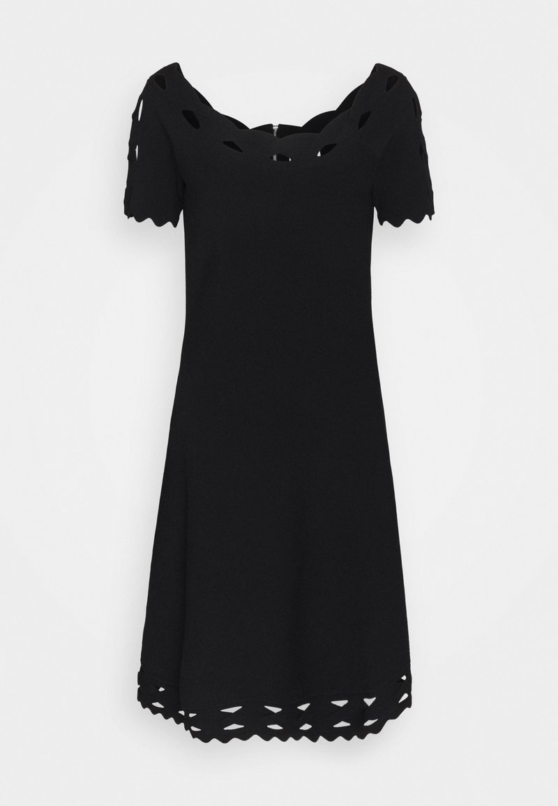 Robe noire longueur genou avec manches courtes, bords festonnés et détails découpés au niveau de l'encolure, des manches et de l'ourlet.