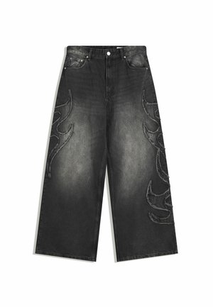 Black wide-leg cropped jeans with faded wash and flame-shaped stitched embellishments on front and sides.