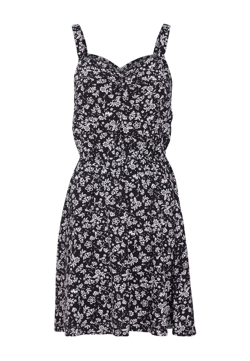 Robe noire à fleurs blanches, bretelles fines, corsage ajusté et taille élastiquée. Jupe trapèze s'écoulant doucement depuis la taille.