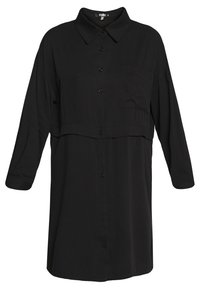 Vestito camicia nero con colletto, maniche lunghe, una tasca sul petto e un design loose e dritto. Realizzato in un tessuto morbido.