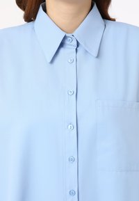 Modanisa BENIN niebieski