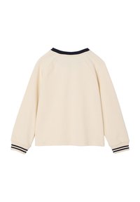Cremfarbener Sweater mit navyfarbener gerippter Crewneck und schwarz-weißen gestreiften Bündchen. Verfügt über Raglanärmel und eine lockere Silhouette.