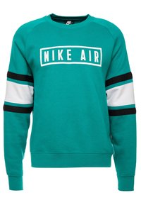 Tealfärgad sweatshirt med "NIKE AIR"-logotyp i vitt, med svarta och vita randiga detaljer på ärmarna. Tillverkad av mjukt material; avslappnad design.