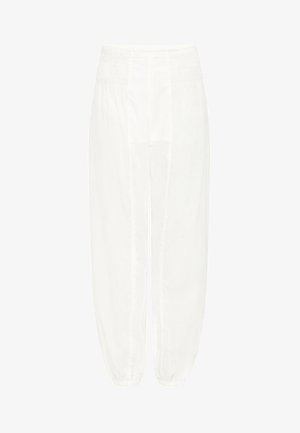 Baltas lina bikses ar elastīgu jostasvīru, sašaurinātiem piedurknēm un brīvu piegriezumu. Iezīmē vertikālās šuves un mīkstu tekstūru.