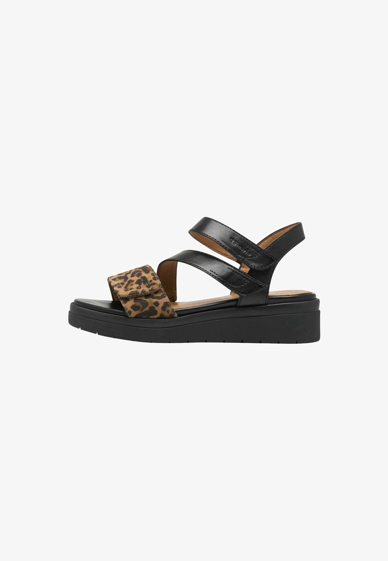 Sandale à plateforme noire avec deux brides en cuir et une bride imprimée léopard sur les orteils, talon ouvert et fermeture réglable.