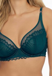 Miękki biustonosz w kolorze morskim z ażurowym haftem, wsparciem w postaci fiszbin, regulowanymi ramiączkami i dodatkami w kolorze różowego złota.