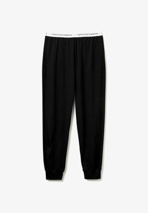 Černé tepláky s elastickým pasem, se znakem "United Colors of Benetton", tapered střih a bočními kapsami.