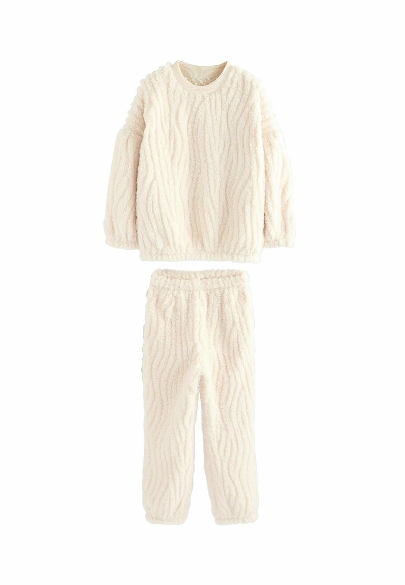 Hyggeligt sæt i cremefarvet fleece til afslapning, med textureret bølget mønster, inklusive langærmet top og bukser med elastisk talje.