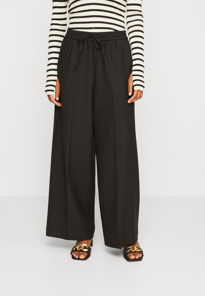 ARKET Broek black/meerkleurig Zalando.be ARKET Broek black/meerkleurig Zalando.be