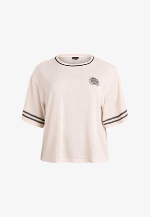 Short-sleeve, cream-colored knit t-shirt with a rounded neckline, black striped cuffs, and a graphic print on the chest.