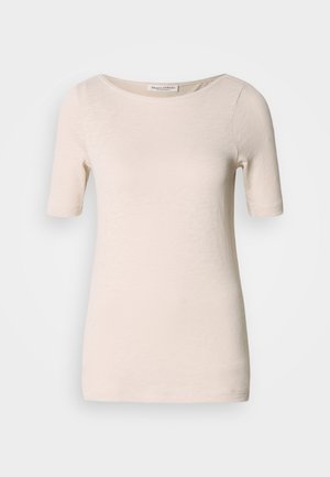 Short-sleeve, crew neck t-shirt in light beige fabric. Soft texture with subtle, uneven pattern. Simple design, no visible hardware or accents.