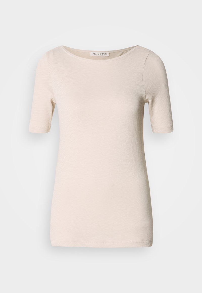 T-Shirt mit kurzen Ärmeln und Rundhalsausschnitt aus hellembeige Stoff. Weiche Textur mit subtilen, unregelmäßigen Mustern. Einfaches Design, keine sichtbaren Details oder Akzente.