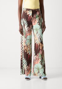 Floral wide-leg trousers in dark brown with green, pink, and beige patterns. Features side checkered detailing. Made of lightweight fabric.