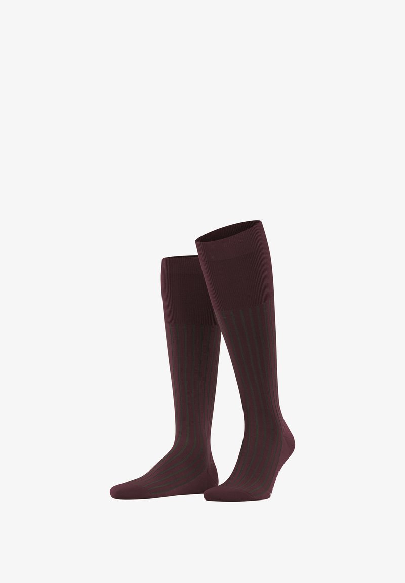 Calze al ginocchio in bordeaux con strisce verticali verde scuro. Presentano un bordo superiore a coste e una consistenza liscia e elastica.