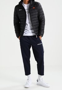 Ellesse Giacca da mezza stagione - black