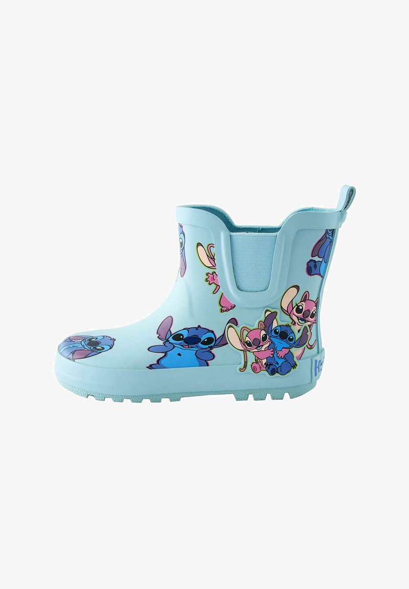 Heledsinine kummist vihmakinga, millel on värvilised multifilmikangelaste graafikad, tekstuuriga tald ja tagaküljel lihtne tõmbehoob.