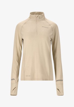 Beige long-sleeve pullover with a half zipper and high collar. Features flatlock seams, thumbholes in cuffs, and a quick-dry label.